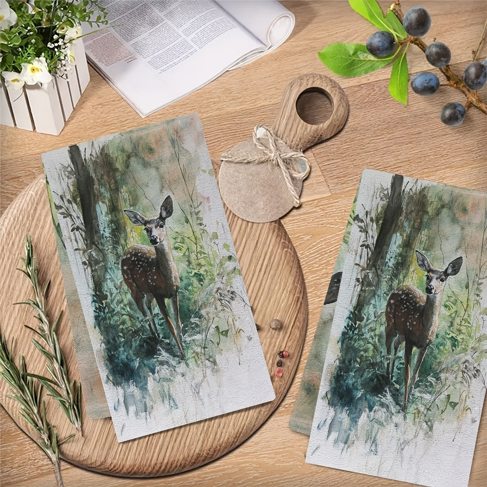 Two pieces of ultra soft kitchen towels featuring a graceful deer in underbrush design. These highly absorbent and machine washable dish hand towels are designed in a contemporary watercolor style, measuring 40.64x60.96 cm. Perfect for holiday decor and