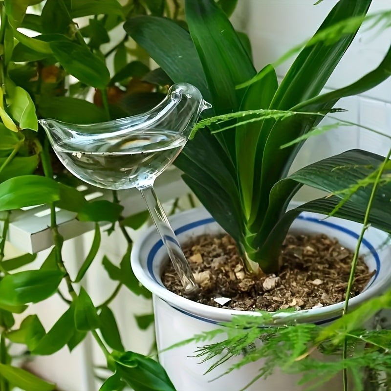 5 bird-shaped self-watering globes for indoor and outdoor plants.