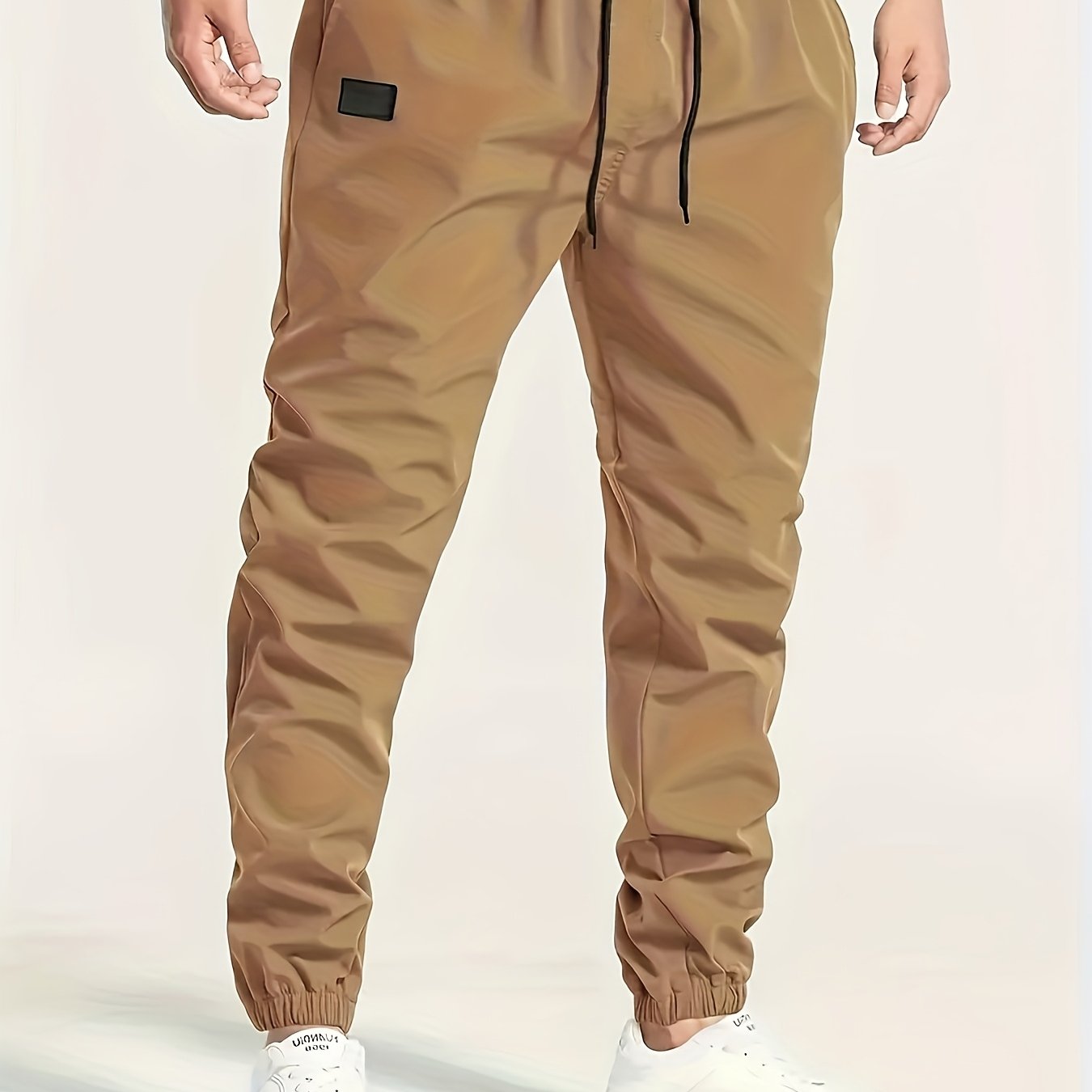 Men's Beige Cargo Pants with Multiple Pockets - Machine washable, comfortable loose fit, ideal for outdoor activities, made of durable polyester fabric.