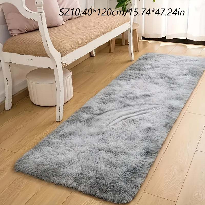 A stylish light grey tie-dye gradient plush carpet perfect for your living room, coffee table, or bedside. This long-haired washable mat is ideal for adding a touch of Nordic style to your bedroom.