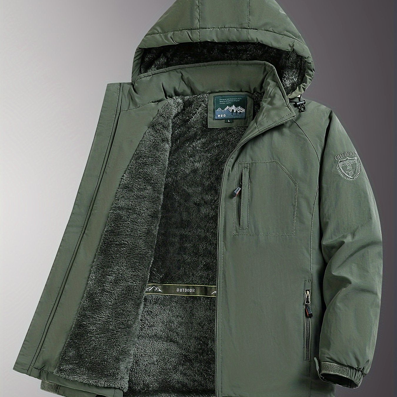 Men's warm fleece-lined outdoor jacket with embroidered design, perfect for fall and winter mountaineering.