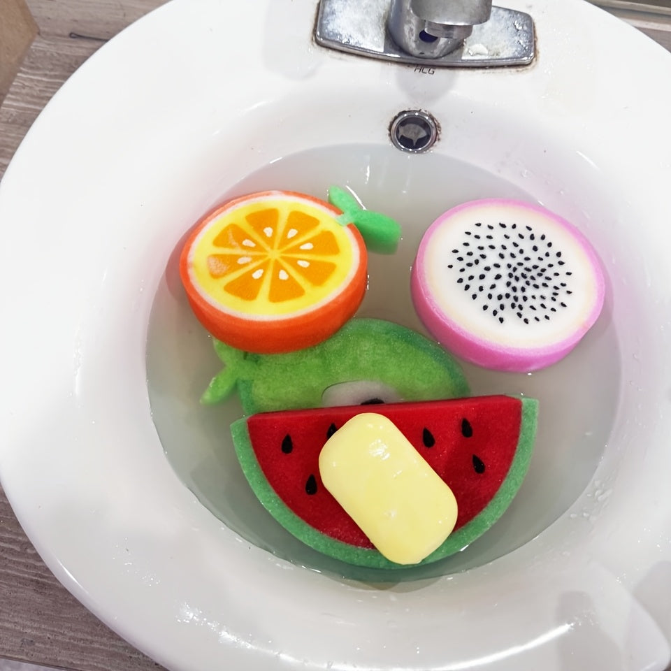 Set of 4 fruit-shaped cleaning sponges made of polyurethane. These multi-purpose scouring pads are perfect for use in the kitchen, bathroom, dishes, car wash, and supermarket. The set includes sponge shapes resembling a pear, orange, dragon fruit, and