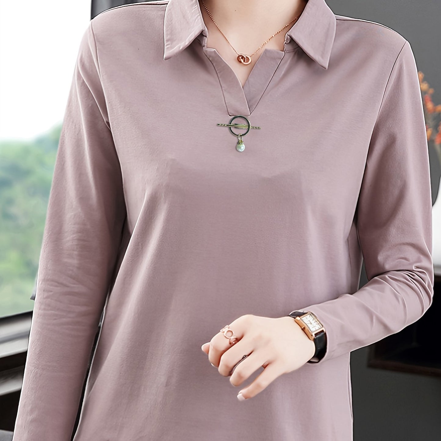 Solid color collared T-shirt for women, good for spring and fall seasons.