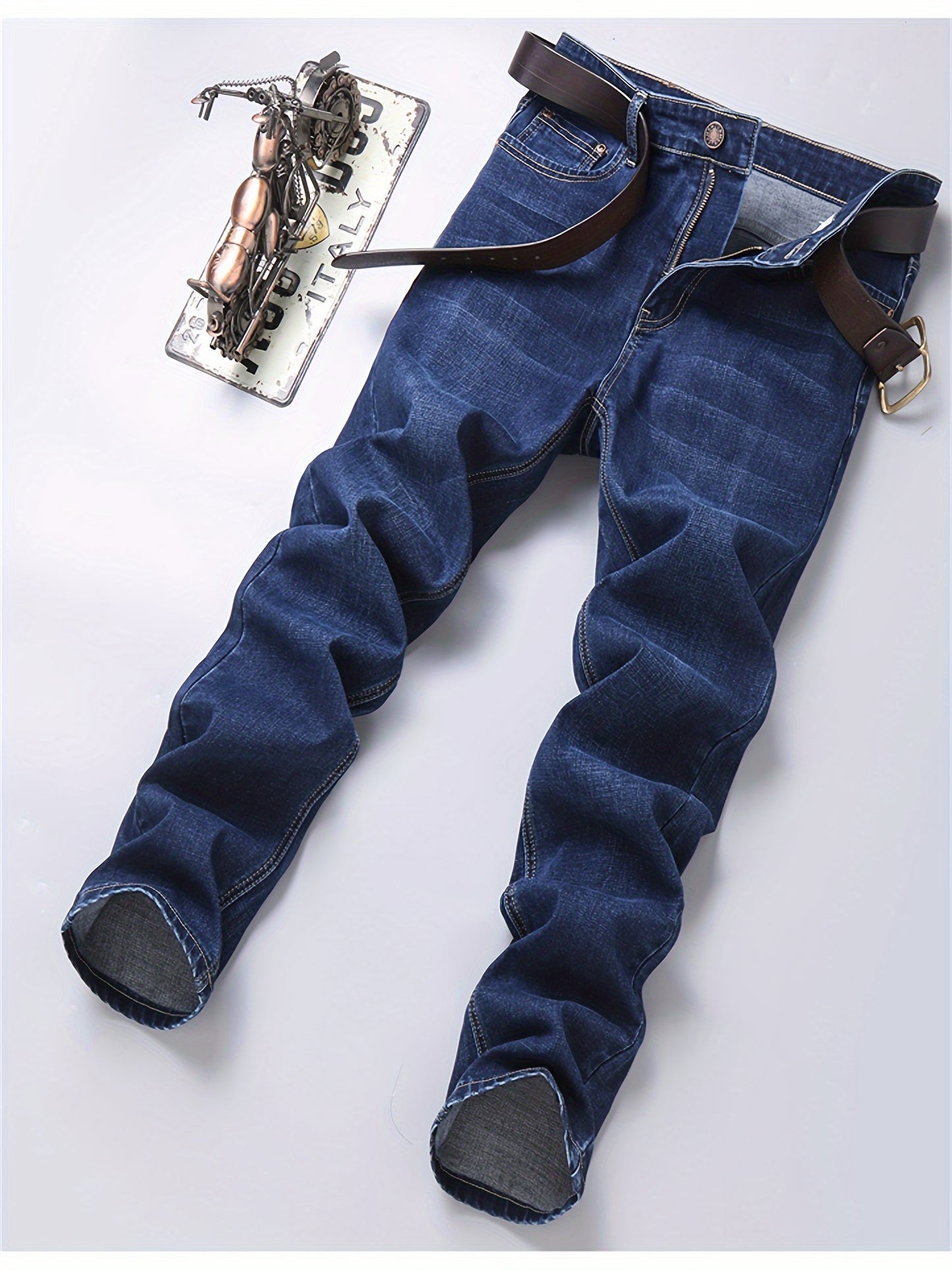 Men's casual cotton blend jeans with pockets, ideal for outdoor activities.