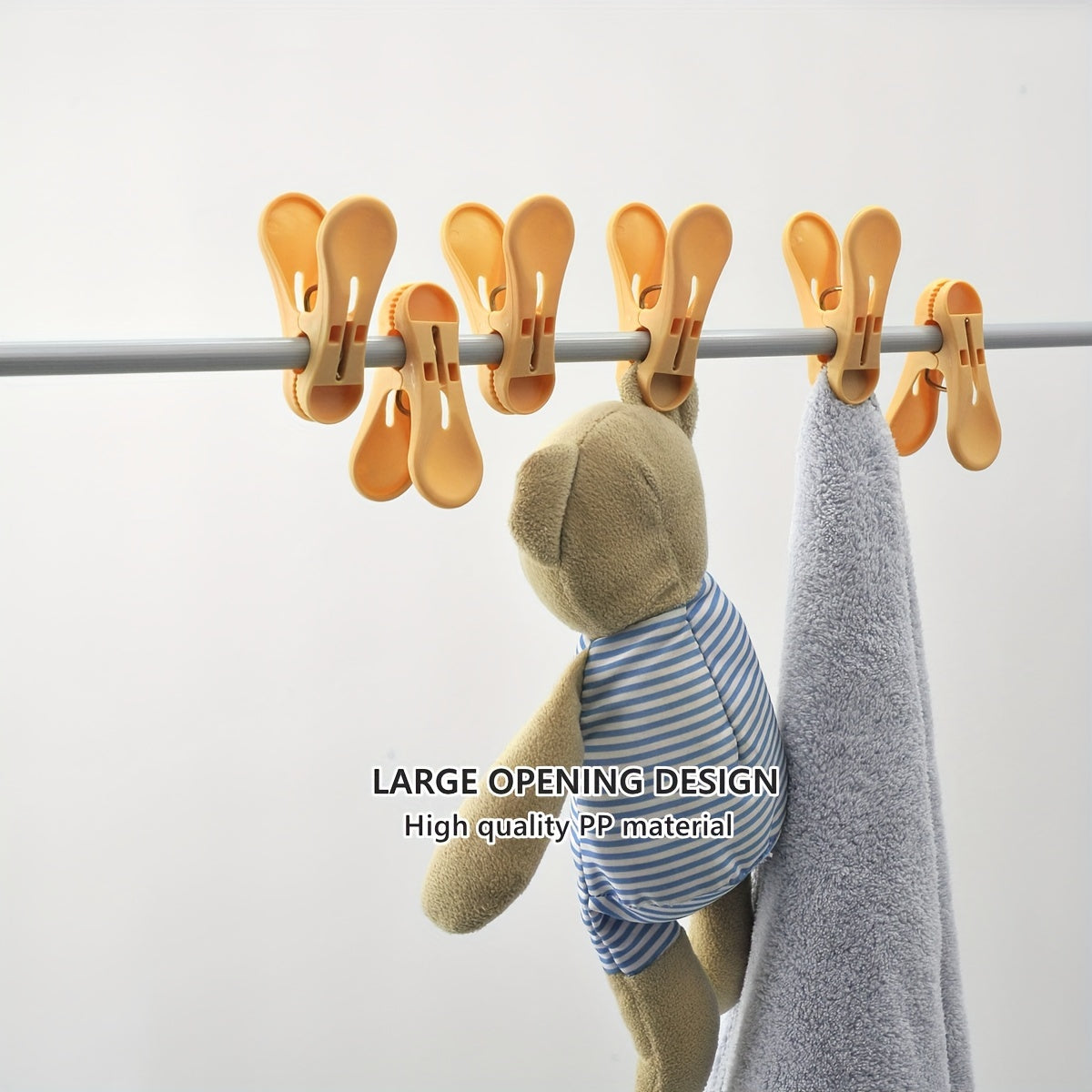 24 pieces of windproof clothespins, durable clips for securing clothes, socks, and sheets on hangers for drying.