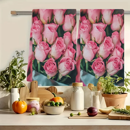 This set includes two ultra-soft kitchen towels with a charming Valentine's Day pink roses design. The towels are highly absorbent and perfect for drying dishes. They also make a great holiday decoration. The towels are machine washable and measure