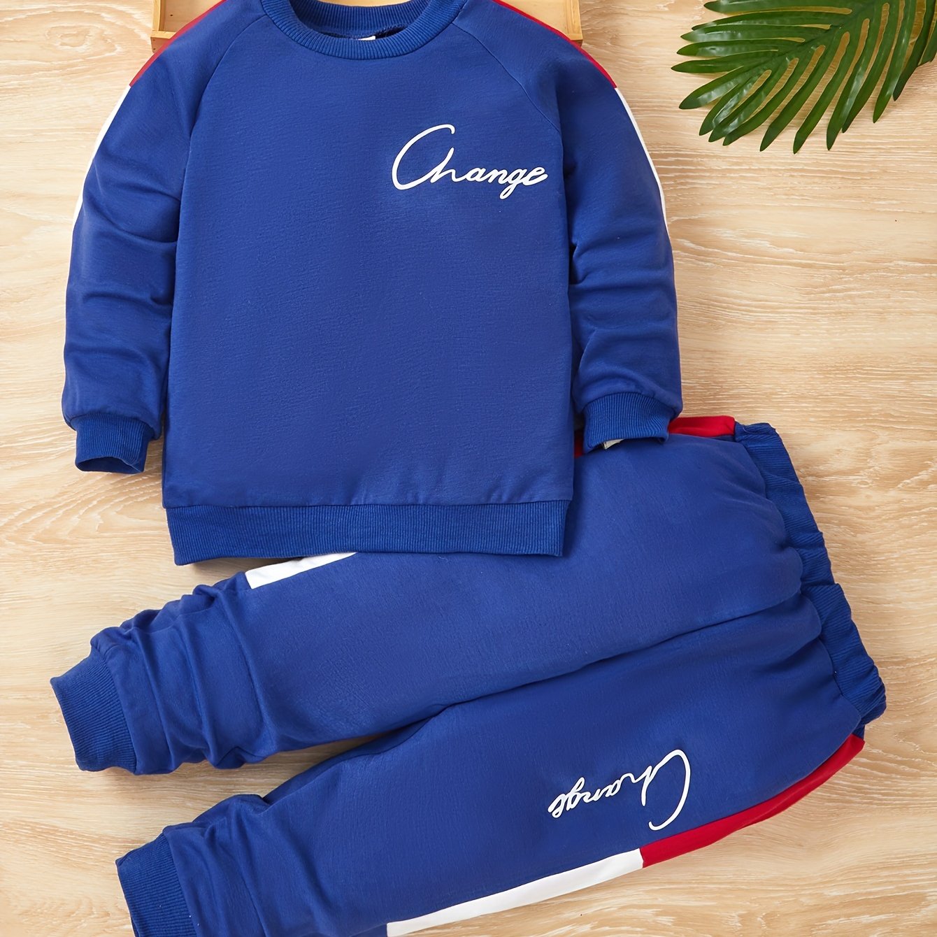 2-piece casual outfit for toddler boys with sweatshirt and sweatpants featuring CHANGE print for spring and fall daily wear.