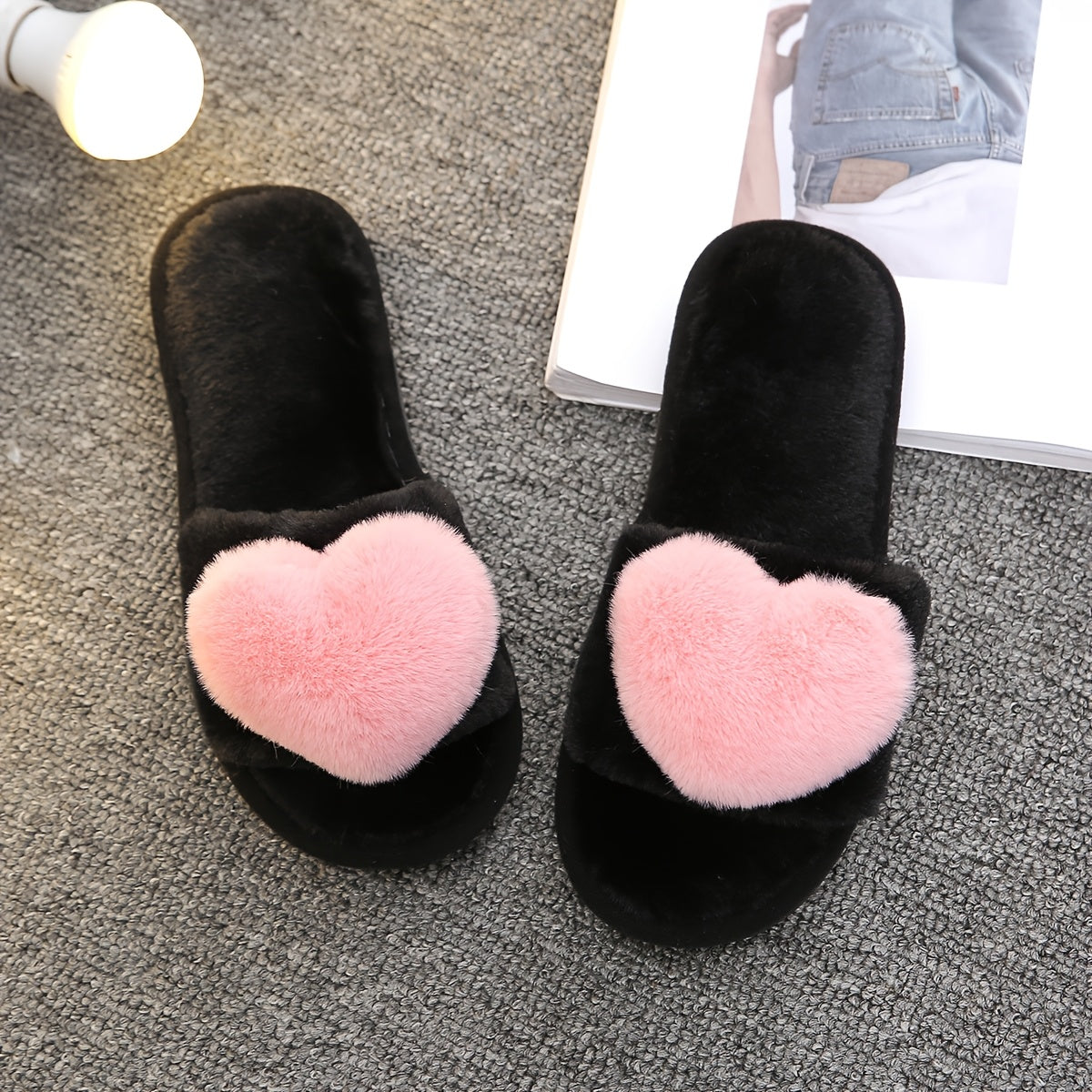 Warm and cozy women's plush slippers with heart accent for indoor comfort and style.