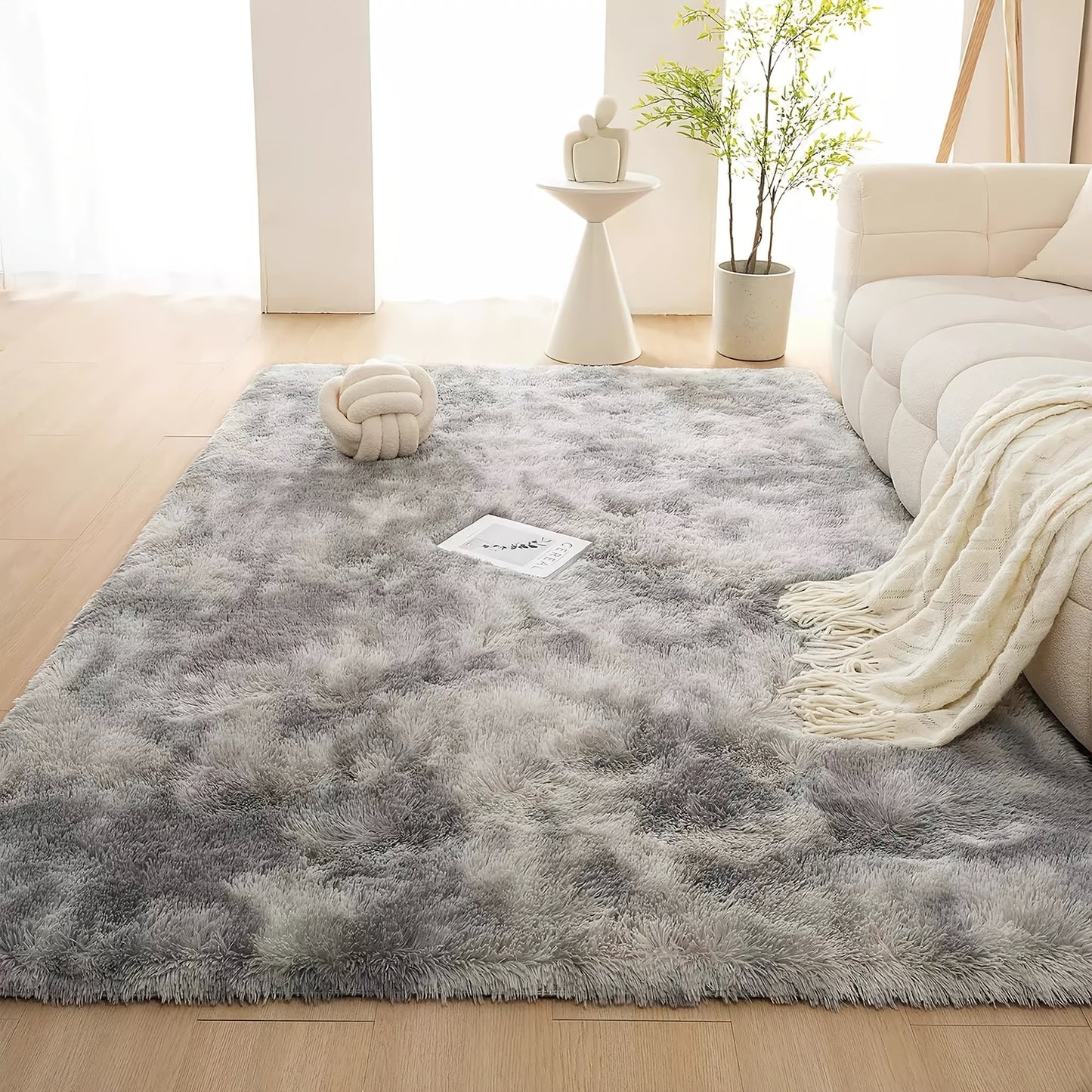 Soft shaggy area rug made of machine washable polyester fiber, featuring non-slip and stain-resistant properties. This cozy indoor carpet comes in a rectangle shape, covering less than 2.16m² and with a longest side under 1.8m. Perfect for living rooms