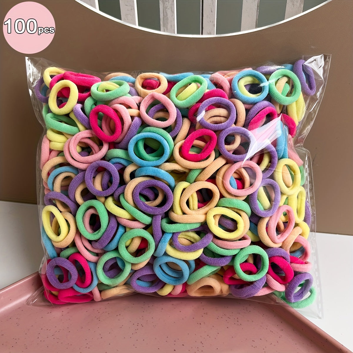 100 high elasticity rubber bands for girls, perfect for creating hair buns and ponytails without causing damage.