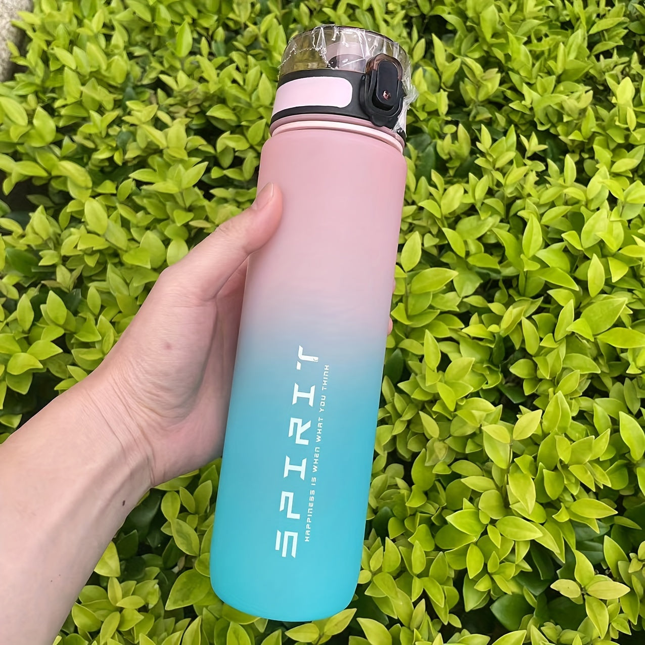 Large capacity water bottle with time scale, ideal for home and outdoor sports - BPA-free, portable and easy to drink from.