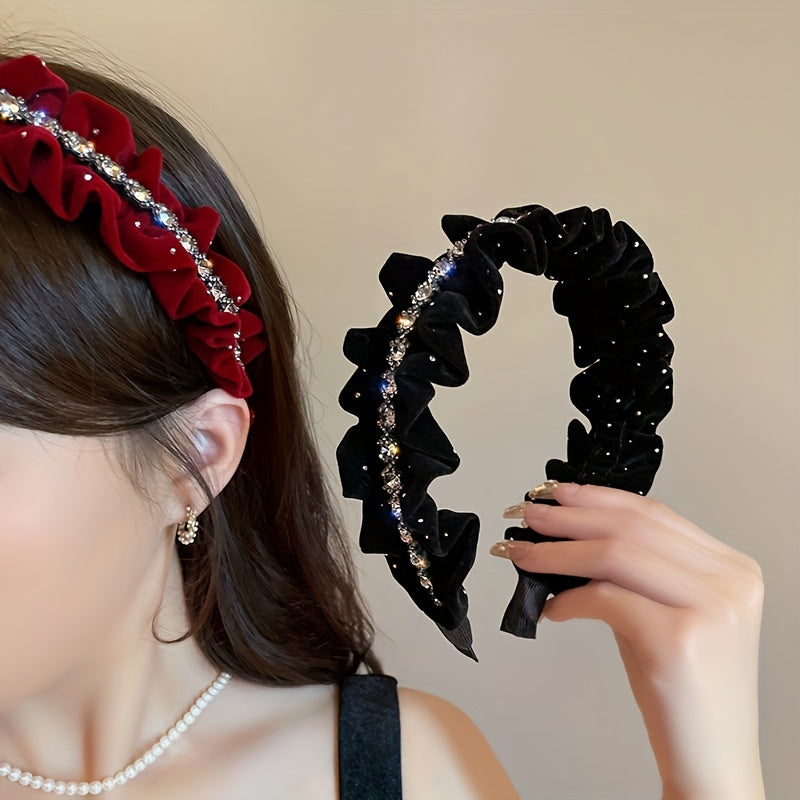 Black velvet headband with rhinestone embellishments, ideal for weddings and formal events.