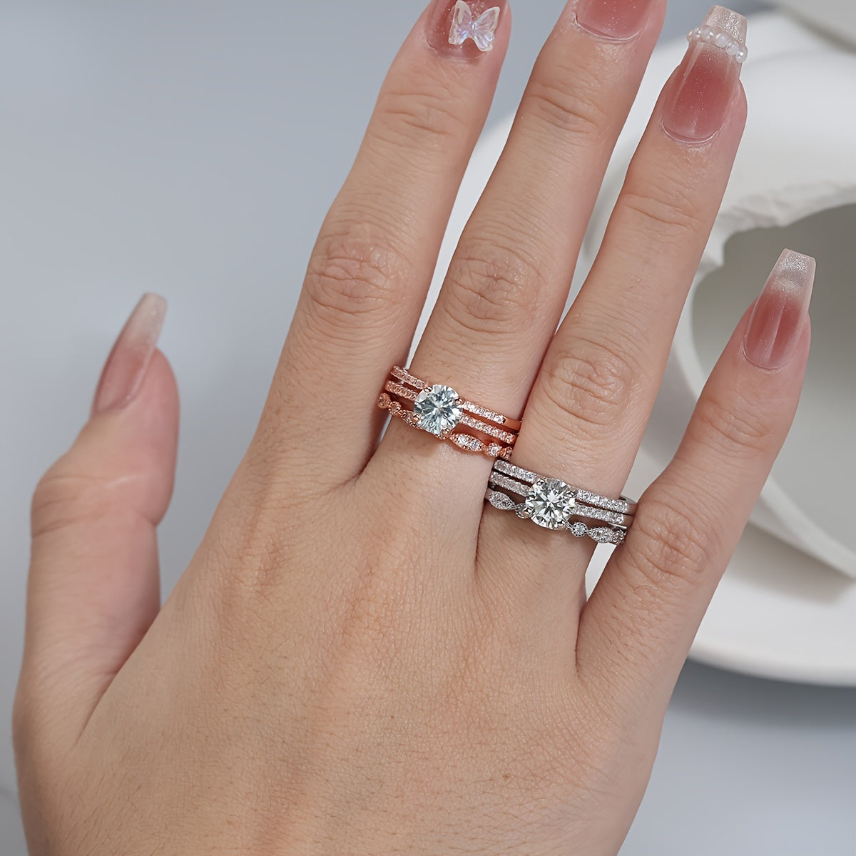 Pick one of these high-quality 925 sterling silver stacking rings with inlaid 1ct, 2ct, or 3ct moissanite for your engagement or wedding. Choose between silvery or rose golden options, each comes with a certificate and gift box.