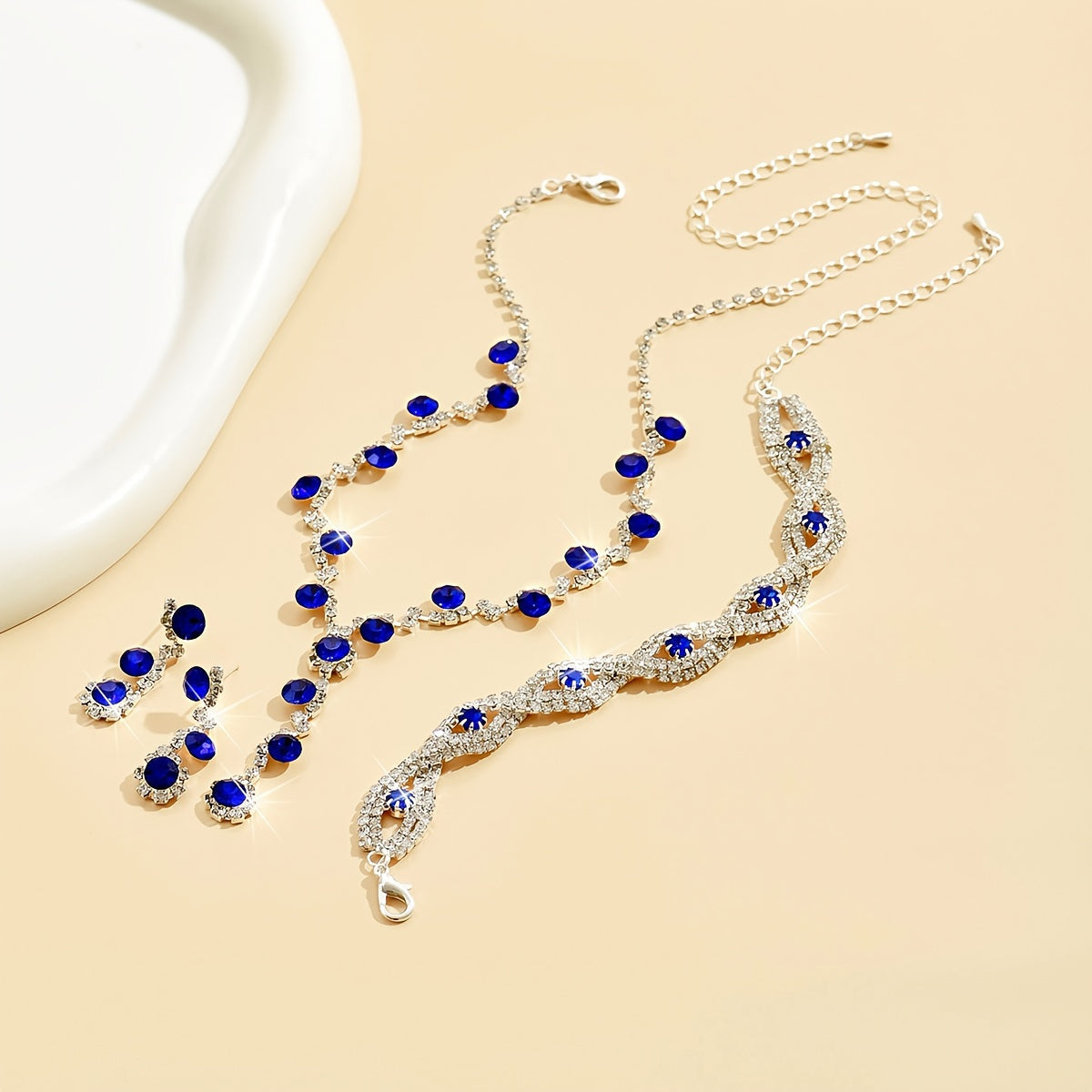 Stunning Jewelry Set in Sapphire Blue - Featuring Silvery-Plated Necklace, Earrings & Bracelet adorned with Synthetic November Birthstone - Ideal for Special Occasions and Celebrations