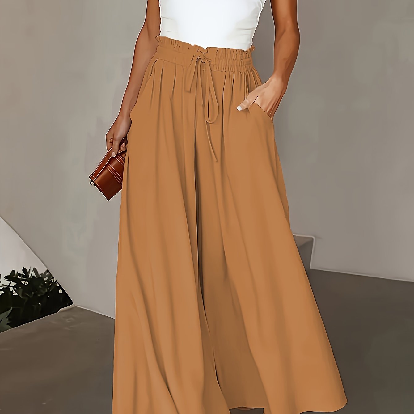 Olive green wide-leg pants for plus size women with high-rise and drawstring waist. Flowy straight cut, machine washable, comfortable for all seasons. Elegant casual style with smooth