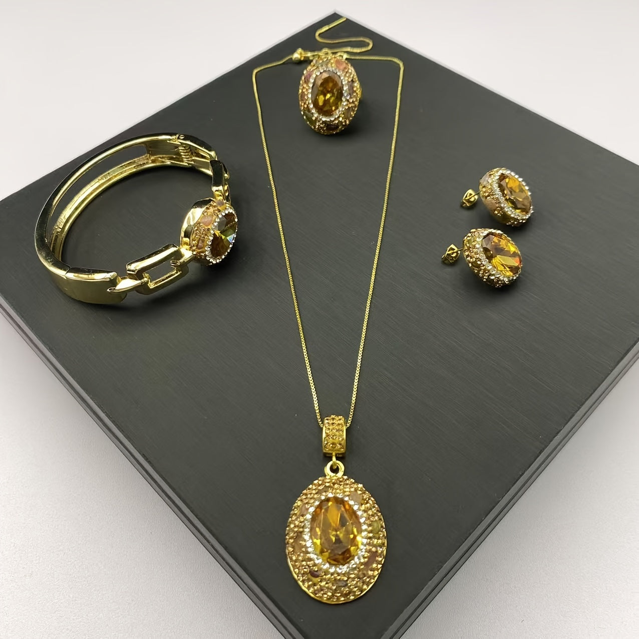 Vintage Tribal Style 18K Golden Plated Jewelry Set for Women, Made with Copper Alloy and Natural Stone - Includes Necklace, Earrings, Bracelet, and Ring. Handcrafted and Elegant, Perfect Gift for Ramadan and All-Season Wear.