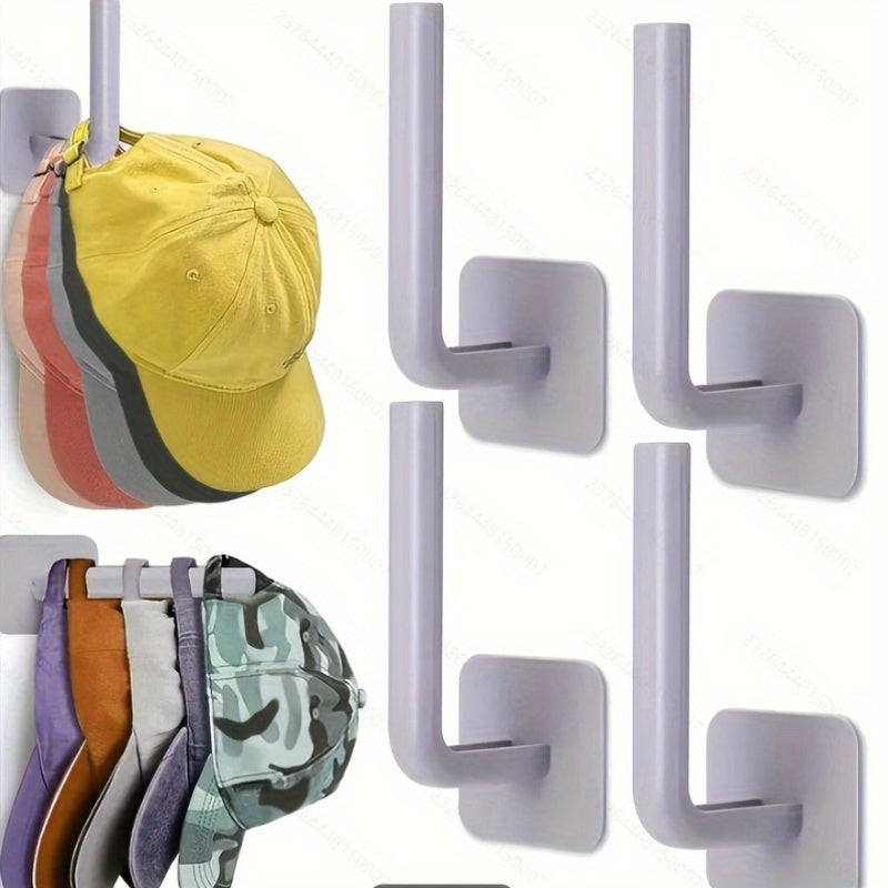 Pack of four plastic hat hooks that are self-adhesive and punch-free - they can be easily mounted on the ceiling without the need for electricity. These hooks are ideal for organizing your entryway, bathroom, or bedroom in a space-efficient manner using