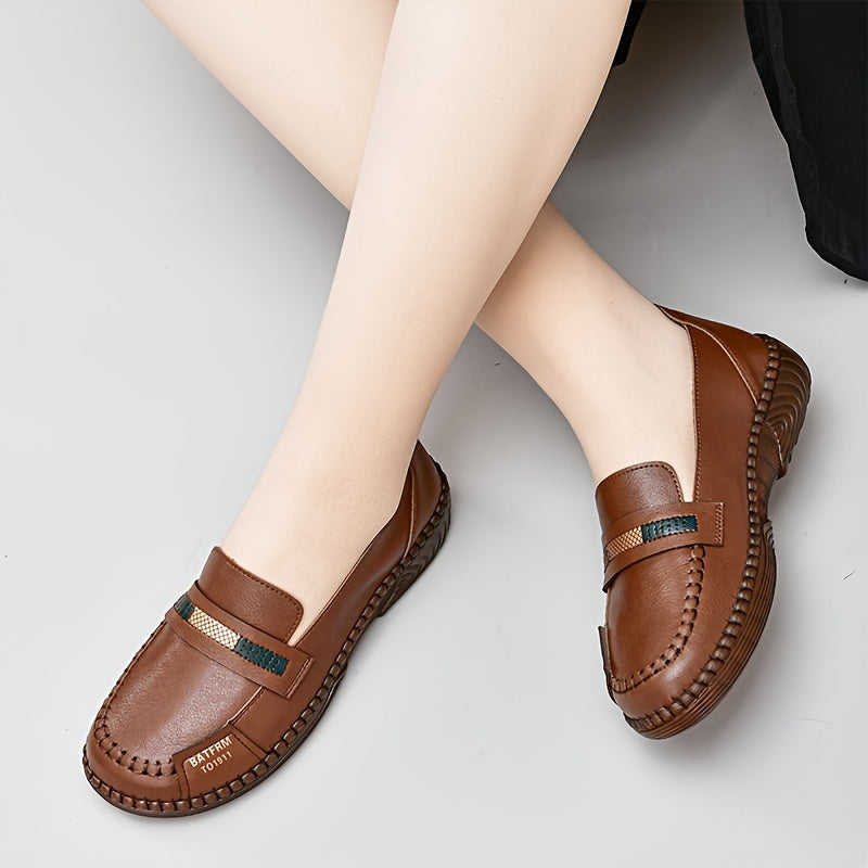 Women's comfortable round toe flat slip-on shoes for walking outdoors.