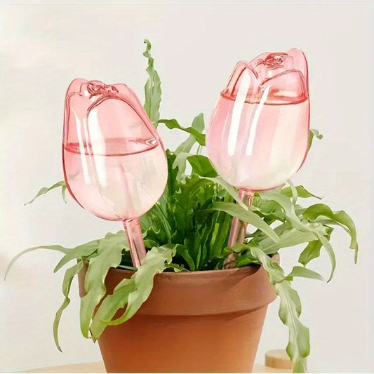 2 or 4 Pink Tulip Plant Watering Balls with narrow outlet design for prolonged use, suitable for indoor and outdoor plants.