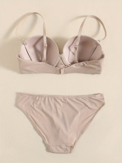 Smooth lingerie set including seamless bra, balconette bra, and bikini panties for women.