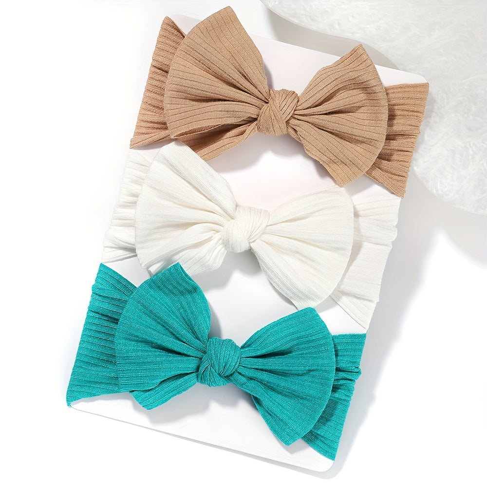 3 soft and stretchy bow hairbands for girls made of comfortable polyester, ideal for hairstyling