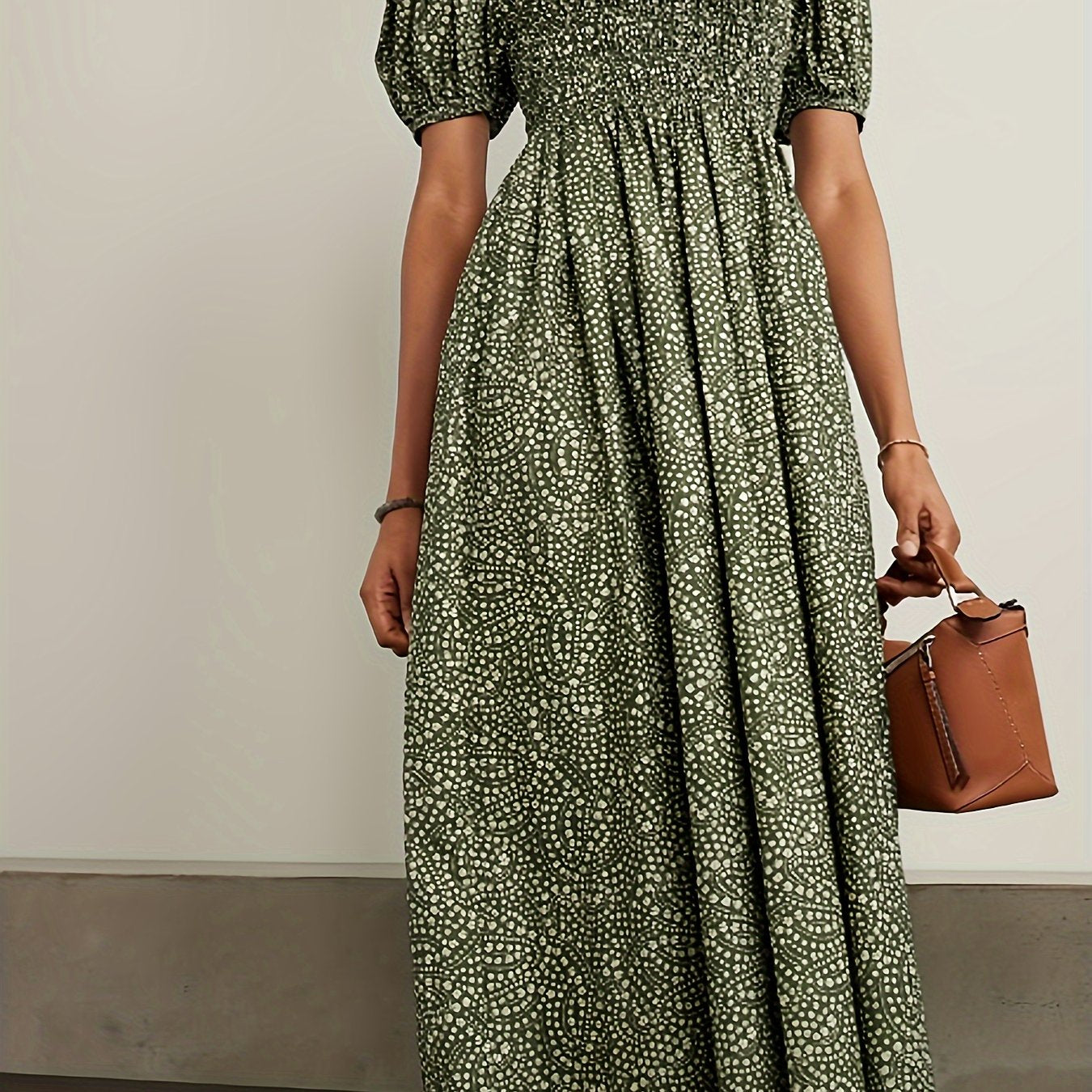 Plus size dress with parallel pleats and floral print, organic green, mid-long length.