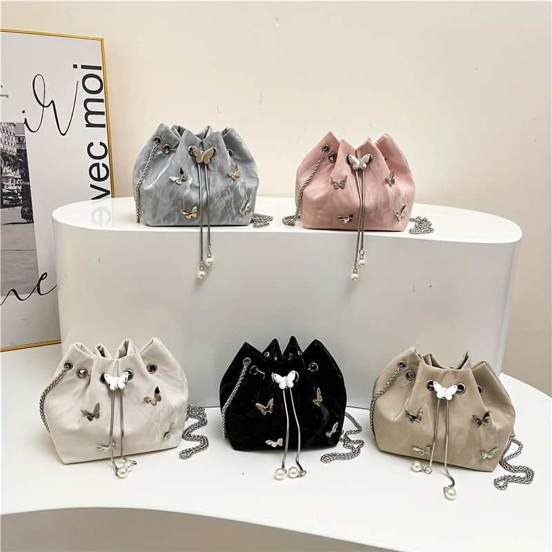 Fashionable women's bucket bag with drawstring closure, available in various colors.