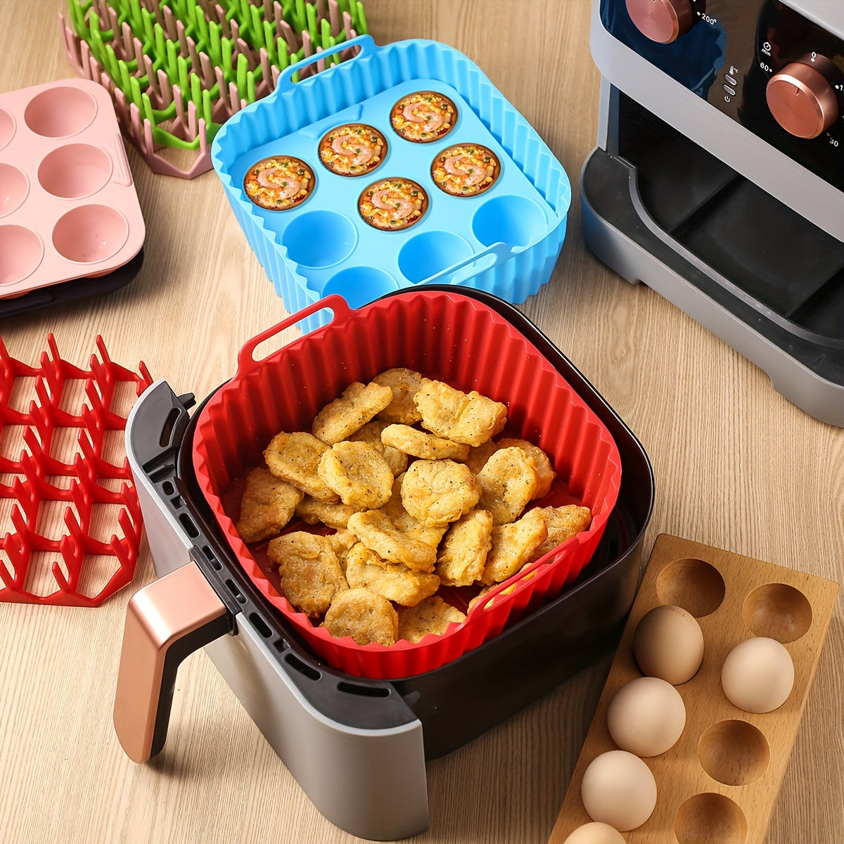 Premium Square Air Fryer Silicone Set includes a bacon & hot dog rack, 9-cavity cake mold, and air fryer pan. This BPA-free and dishwasher safe set is compatible with 7QT+ air fryers.