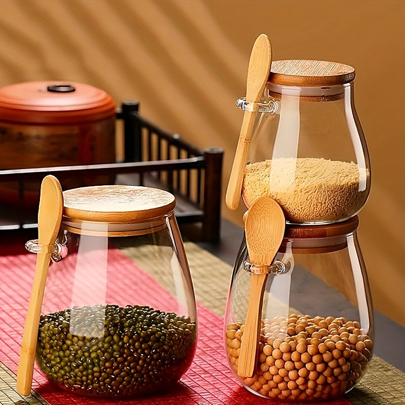 Introducing a single glass jar with a bamboo lid, designed with a wide opening and leak-proof features. This jar includes a spoon and can be reused. Perfect for storing coffee beans, tea, grains, dried fruits, and more. Available in three sizes