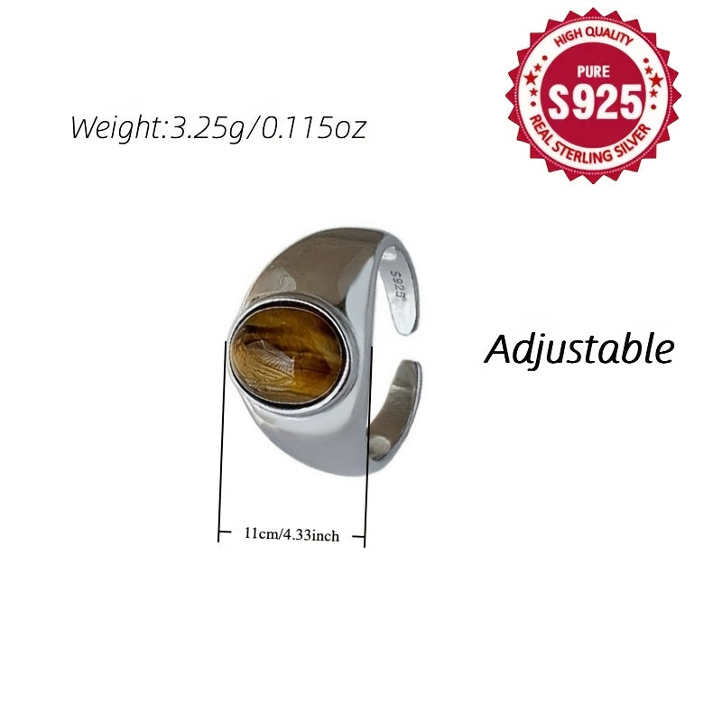 A versatile S925 silver ring adorned with a natural Tiger's Eye stone, offering impeccable quality and intricate design. Perfect for both men and women, showcasing a stunning appearance that is ideal for gifting or wearing on any occasion, whether it be