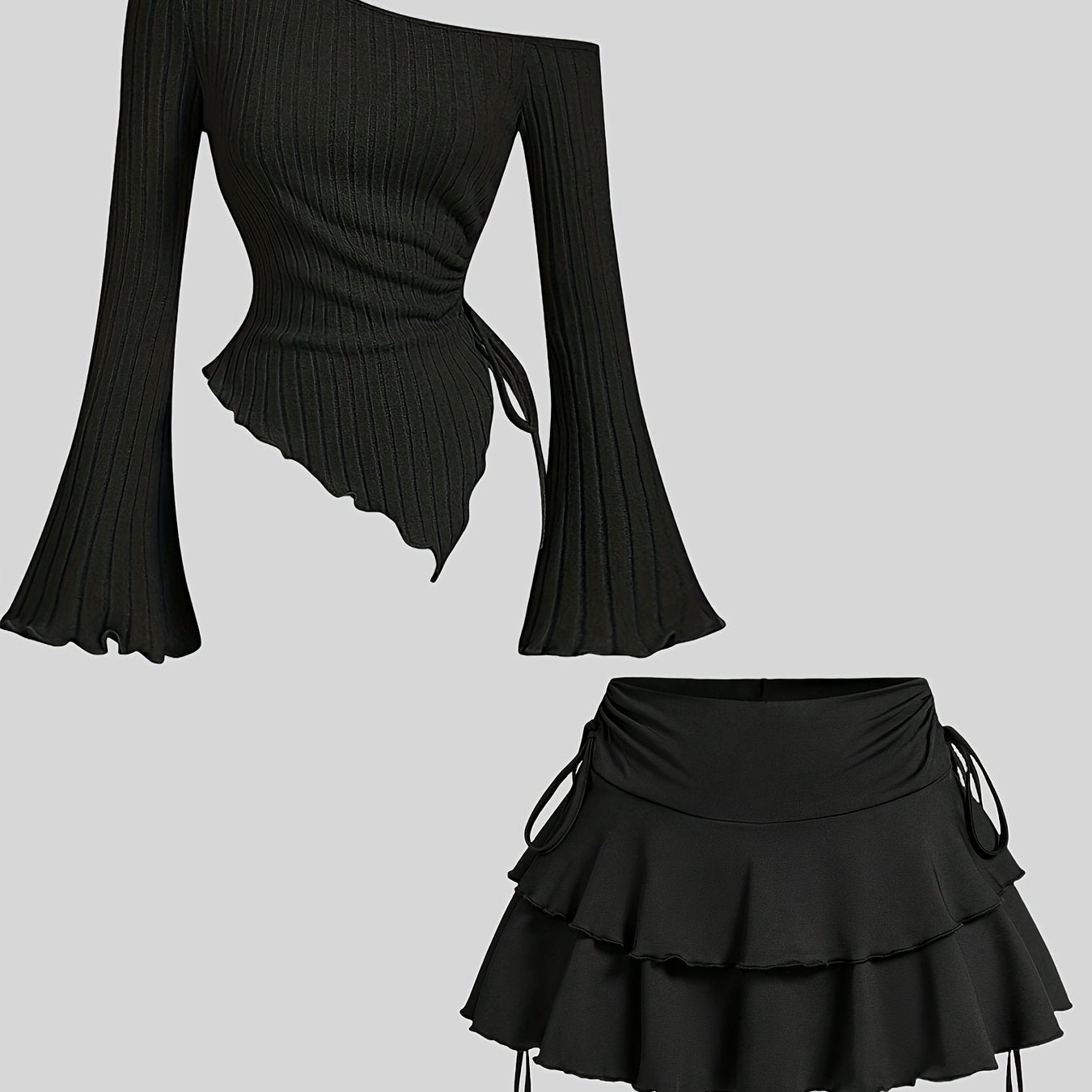 Black polyester knit outfit for spring/summer with off-shoulder top and ruffle skirt.