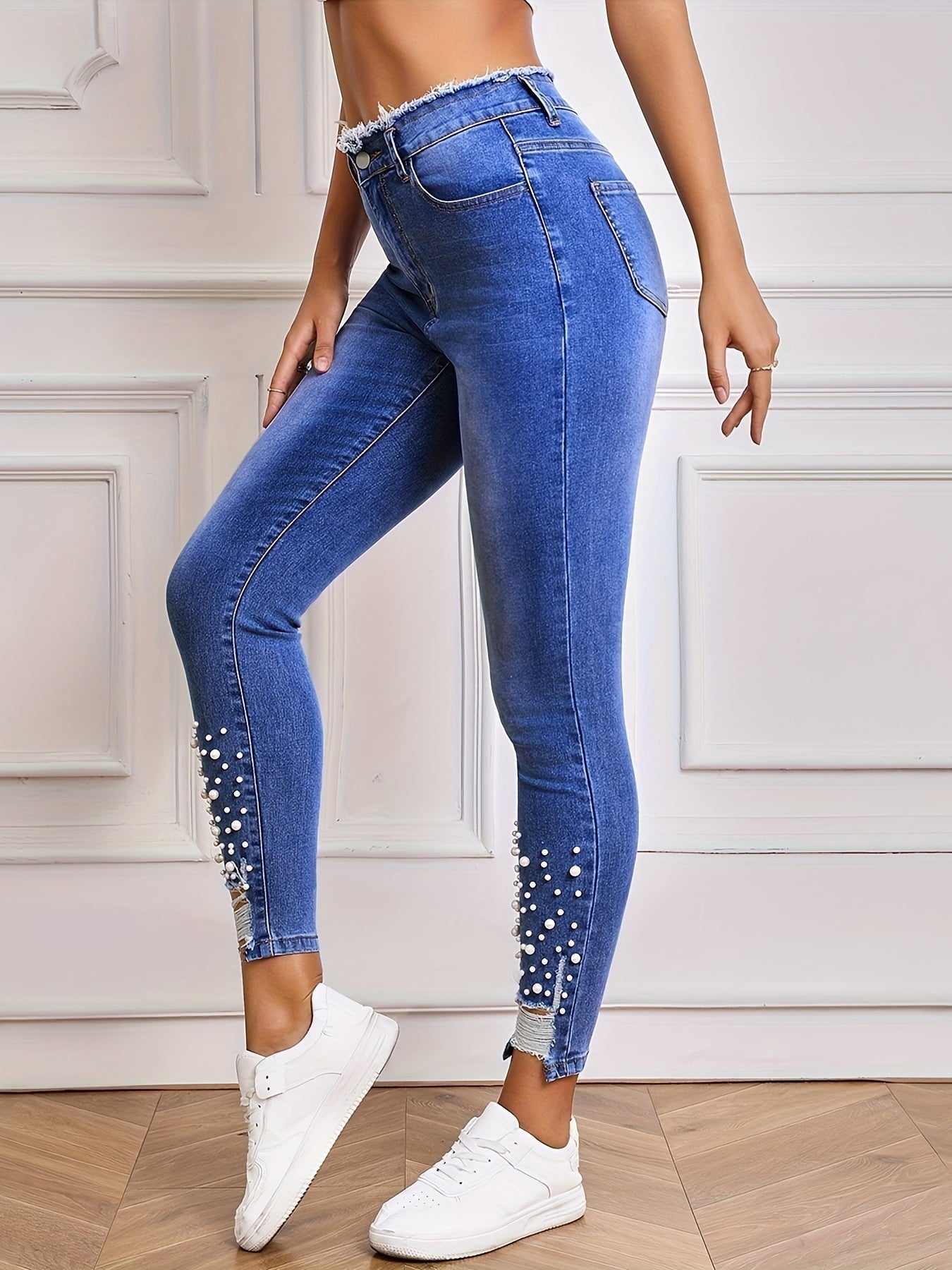 Women's high stretch tight jeans with faux pearl décor