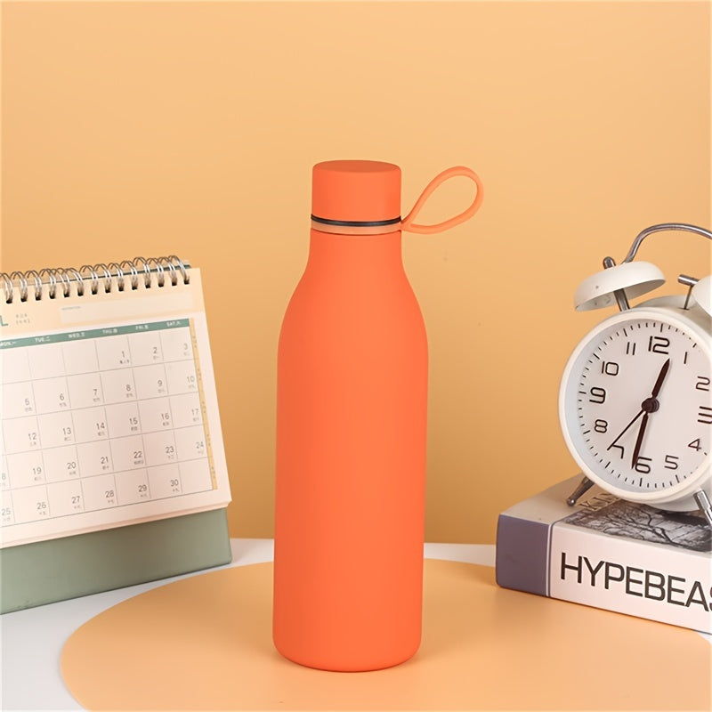 Stainless steel vacuum insulated water bottle with carrying handle, leak-proof design, and 500ml capacity, perfect for outdoor activities and gifts.