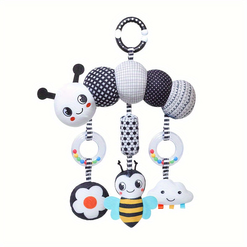 Soft and cuddly black and white animal wind chime plush toys, perfect for baby car seats and strollers. These hanging rattle toys are made of soft cloth and come from the Chinese Mainland. An ideal Christmas gift for infants aged 0-3 years old.