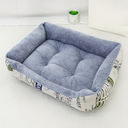 Soft light blue dog bed with newspaper print border, suitable for small, medium, and large dogs. Provides all-season warmth and comfort. Stylish and warm pet cushion.