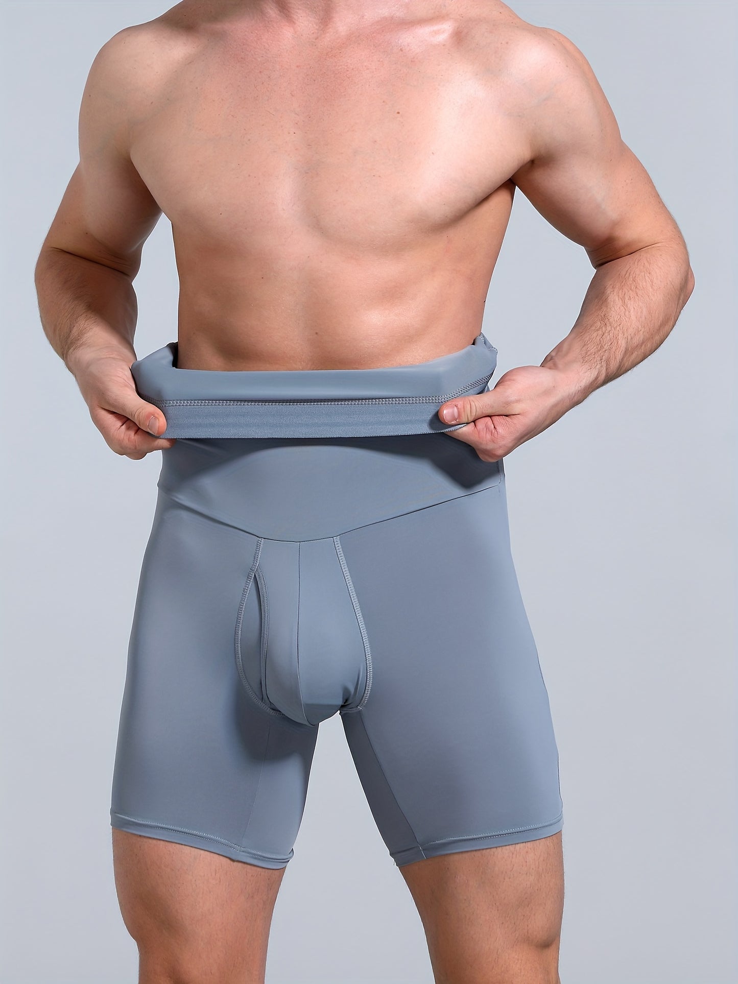 Men's high waist tummy control shorts for slimming in grey color, with body shaping and leg underwear features.