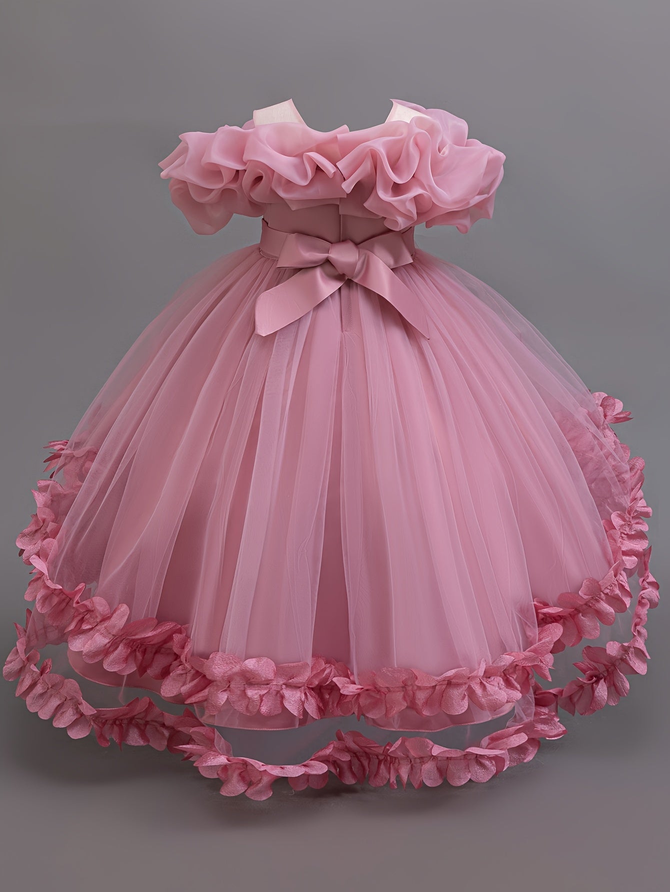 Sleeveless princess dress for girls with high-low hem, floral appliques, belt detail, and breathable polyester blend.