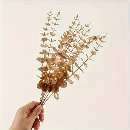 10 lifelike golden eucalyptus stems - sturdy artificial plants for indoor/outdoor decor, ideal for table centerpieces, garden, weddings, Christmas projects.