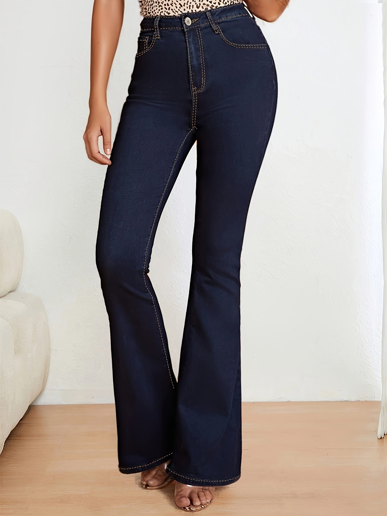 Blue stretch denim flare jeans for women, slim fit, high-waisted with button closure, machine washable.