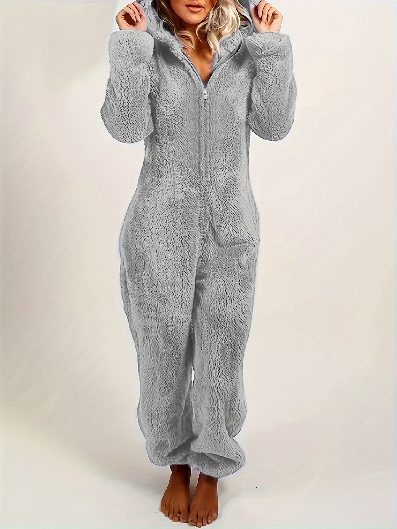 Fuzzy hooded pajama jumpsuit for music festival, comfy and cute lingerie and sleepwear.