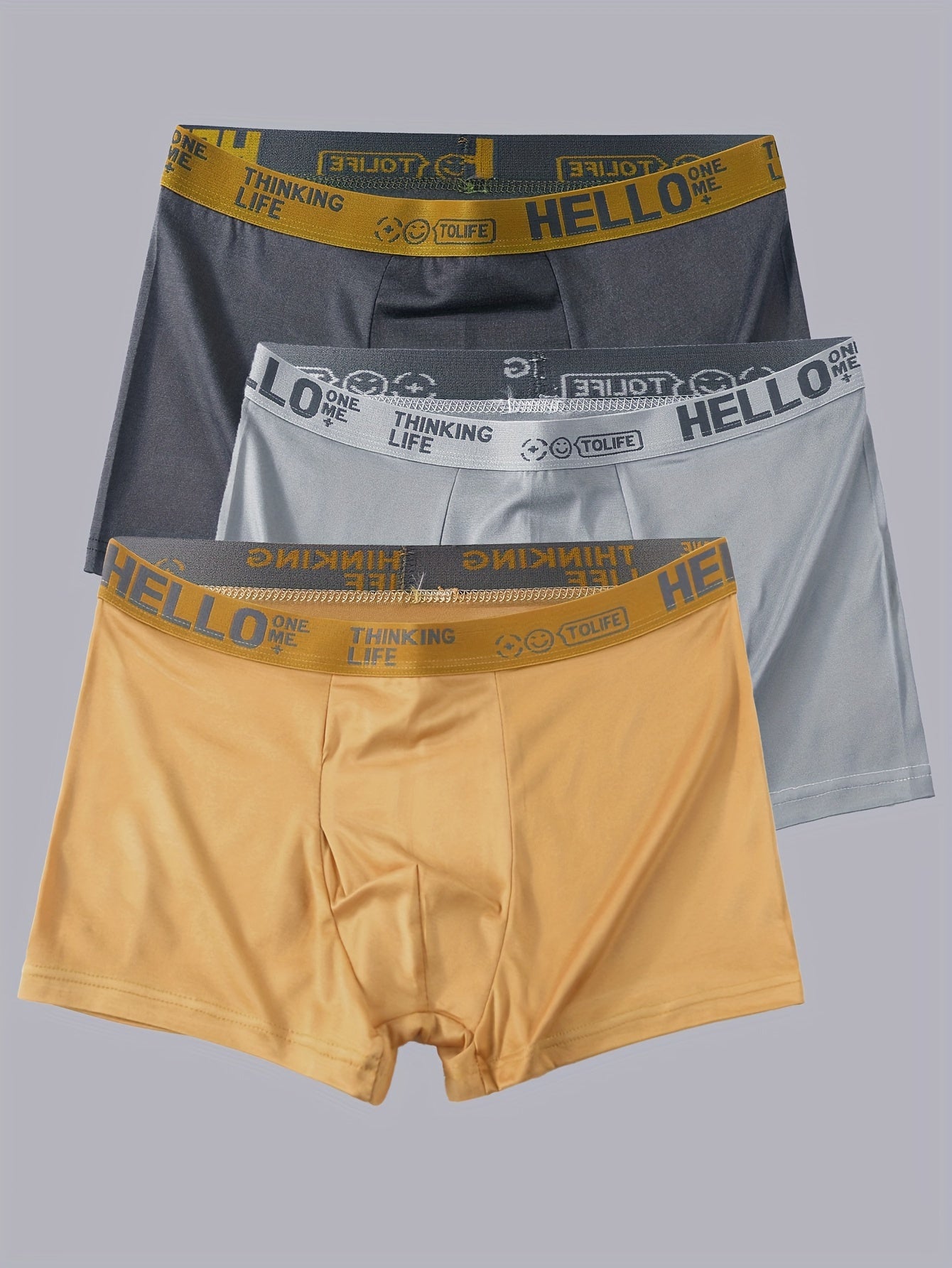 3pcs of men's boxer briefs with 'Hello' print in assorted colors, made of a polyester/spandex blend for breathability, comfort, and quick-drying qualities.