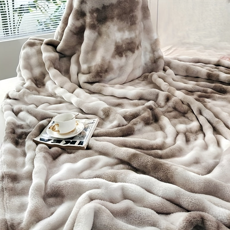 Soft and plush faux fur throw blanket for ultimate luxury and comfort. Perfect for cozying up on the couch or adding a touch of elegance to your bedroom or living room. Machine washable for easy care, suitable for all seasons. Measures 99.06x149.86cm.