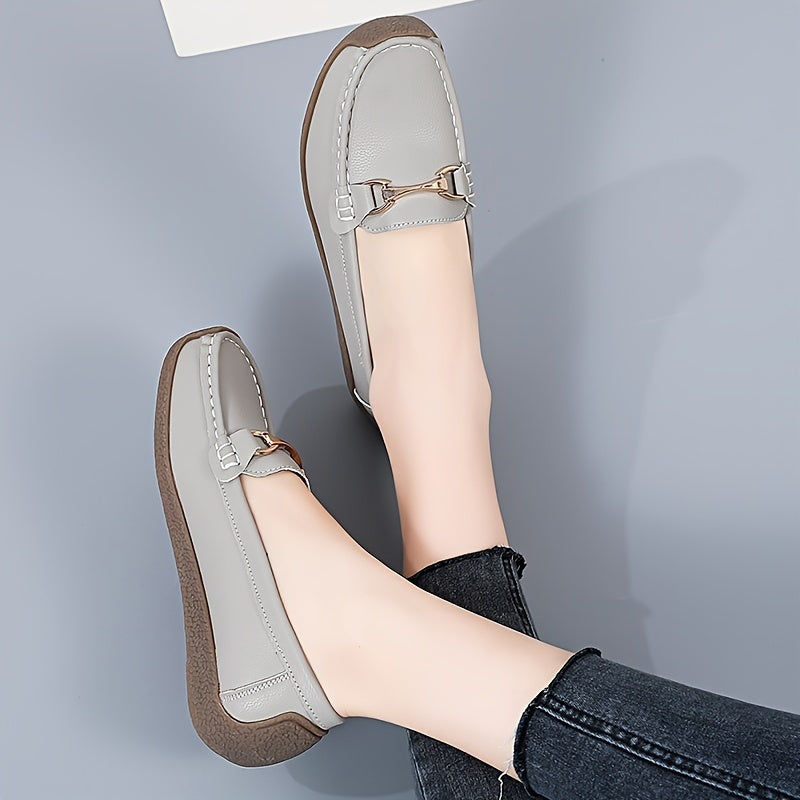 Women's metal decor slip on loafers for casual walking with non-slip flat soles.