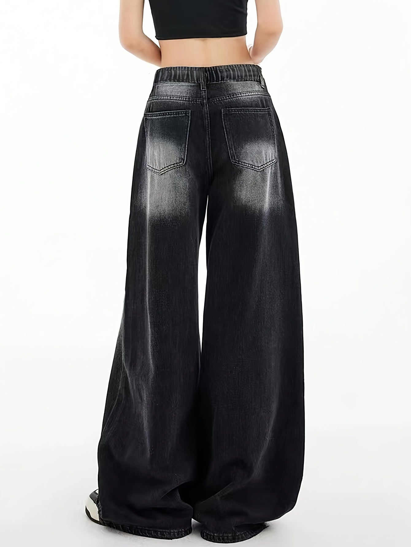 Chic black washed denim pants for girls, slim and straight-legged, perfect for casual and versatile styling.