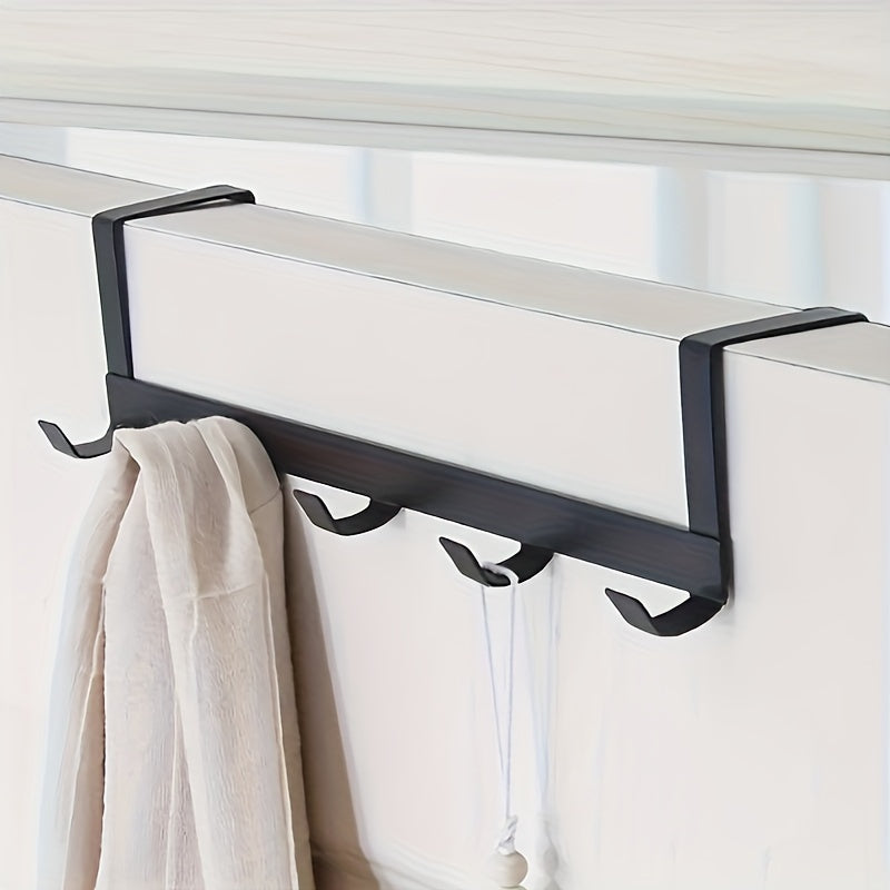 Contemporary 5-hook metal rack, 29cm long, rust-resistant with polished finish. Easy to install and suitable for hanging towels and clothes. Practical and affordable.