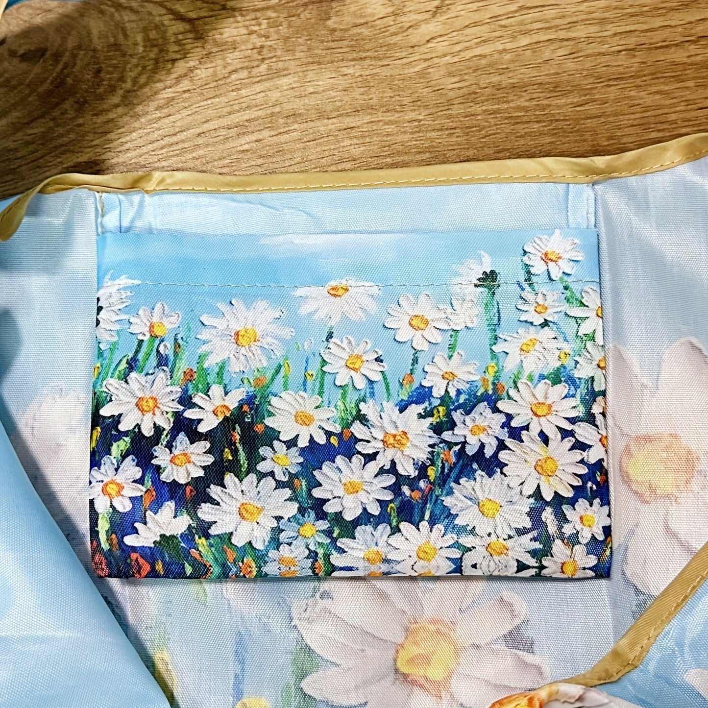 Reusable foldable grocery shopping tote bags featuring an oil painting pattern of flowers. Perfect for travel and conveniently fits in your pocket. Easily machine washable for reuse.