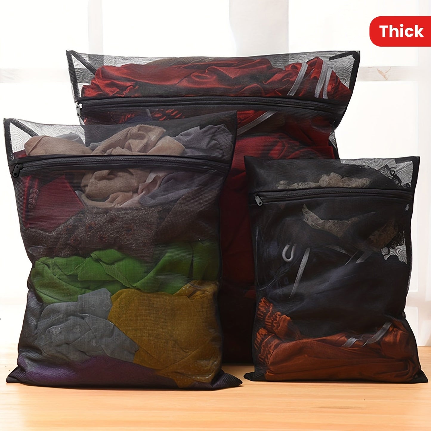 Set of 3 extra thick washing bags, perfect for household use in the washing machine. Made of durable mesh material.