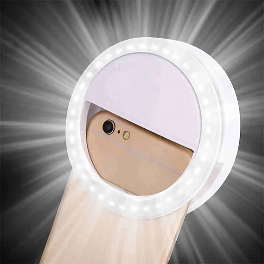 Portable LED ring light for phone to enhance face beauty during live streaming and selfies.