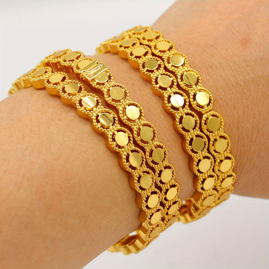 Set of 4 Ethiopian vintage luxury style gold-plated copper bracelets for women, featuring an open cuff design adorned with hollow round beads. These bracelets are perfect for both daily wear and parties, adding a touch of elegance to any outfit.