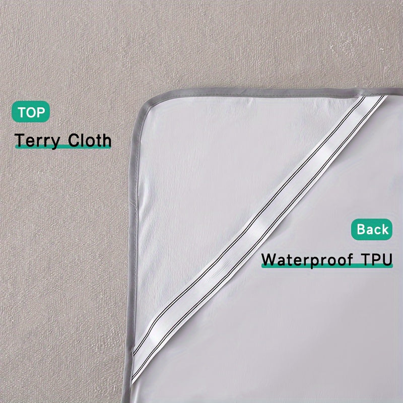 Waterproof mattress topper cover in grey/white color made of 100% polyester. Knitted fabric that is machine washable with a pull-on closure. Straps are included for a secure fit on single/double beds. Does not include a pillowcase.